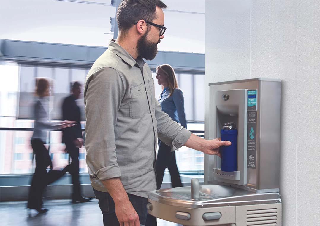 employee-filling-water-bottle